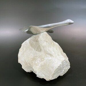 Hoselton Canada Art Polished Aluminum Goose in Flight on Stone Base Sculpture